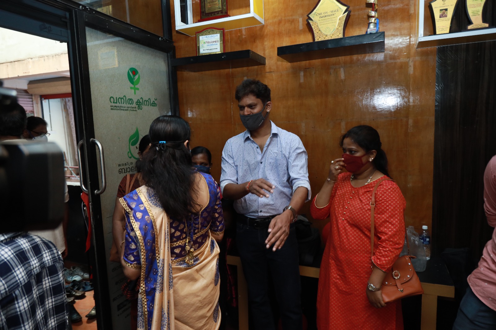 Visitors at the entrance to the Vanitha Clinic during the centre's opening